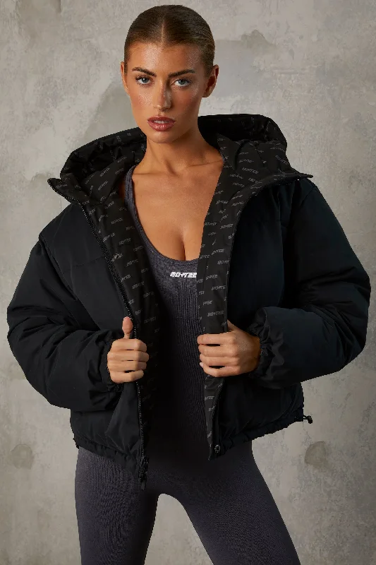 layer-up-reversible-puffer-with-repeat-logo-black