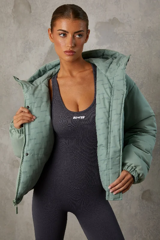 layer-up-reversible-puffer-with-repeat-logo-iceberg-green